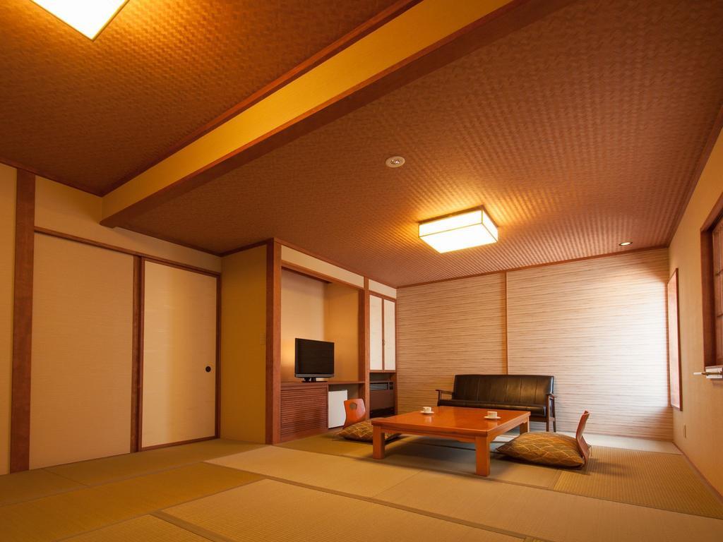 Kusatsu Onsen Ryokan Yoshinoya Hotel Стая снимка